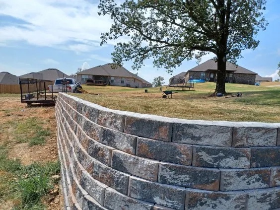 Curved block retaining wall on a residential lot