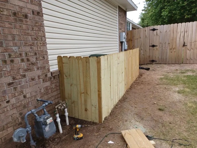New wood privacy fence installation